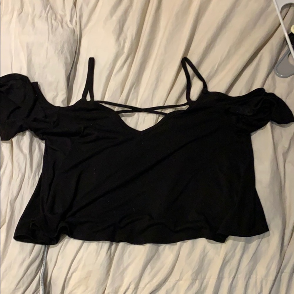 Strap of tank top off shoulder